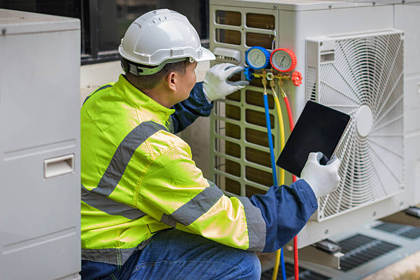 Professional Heat Pump Repair technician working in Big Bear Lake, CA